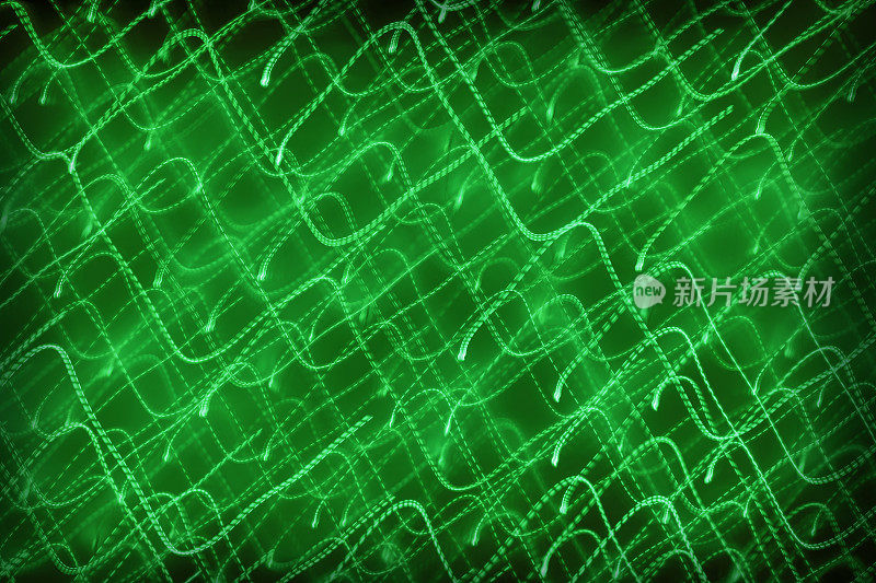 带运动模糊效果的抽象散焦灯光背景(绿色)