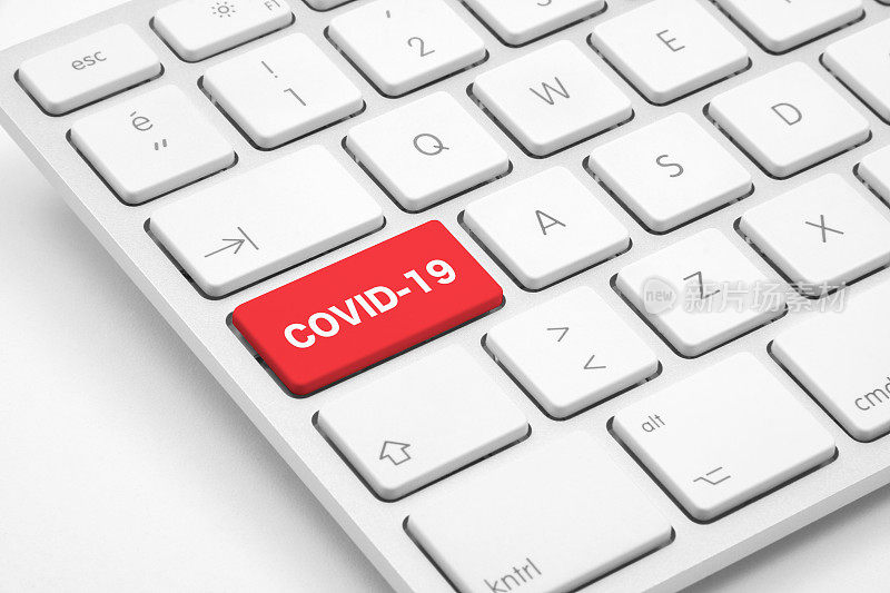 冠状病毒，键盘上的“Covid-19”概念。