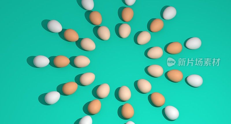 不同颜色的鸡蛋在蓝绿色背景同心圆