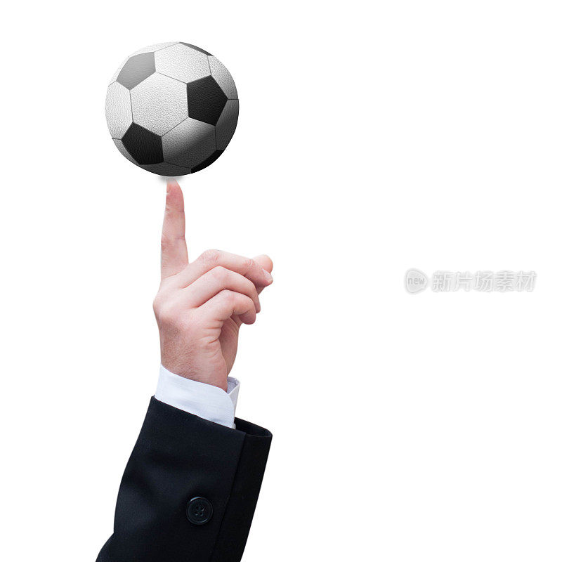 商人的手用手指捏着一个小足球