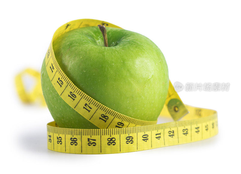 青苹果配黄卷尺节食概念