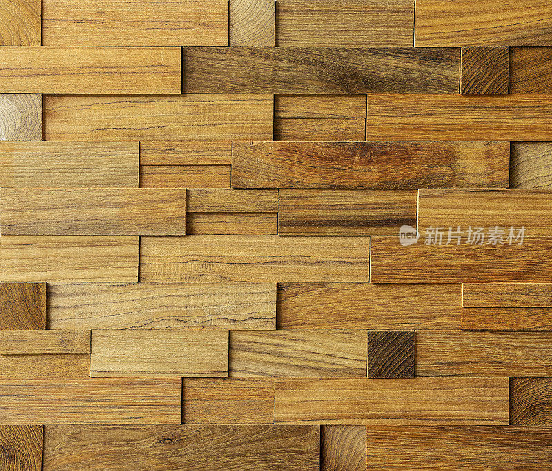柚木木块型材背景，不同大小的木块堆叠成抽象的木块背景。