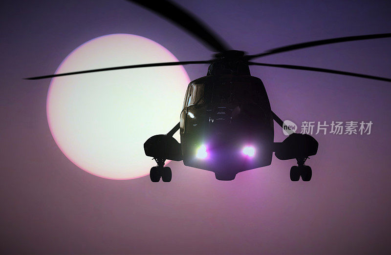 日落时飞行的军用直升机