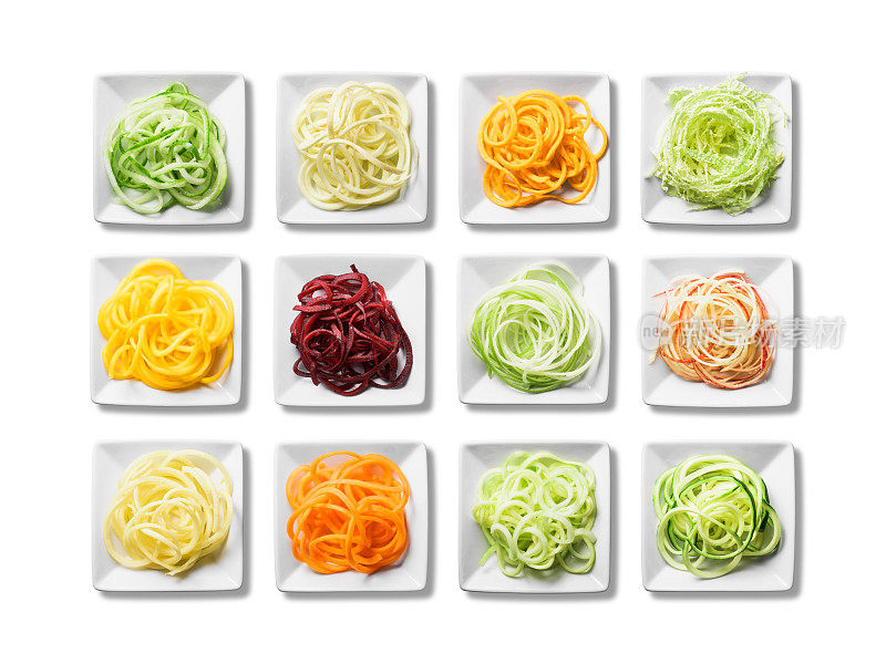 12盘新鲜鲜亮的螺旋形水果和蔬菜
