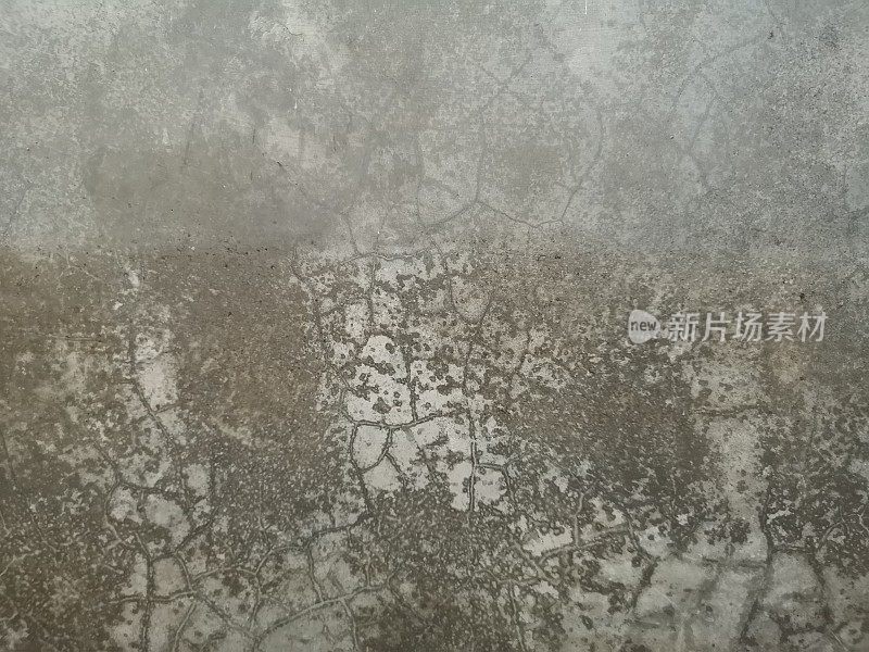 裂缝老在水泥墙面完成光滑抛光表面纹理混凝土材料为背景，灰色颜色，楼面建筑施工建筑