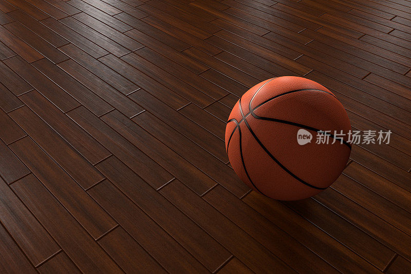 篮球放在镶木地板上