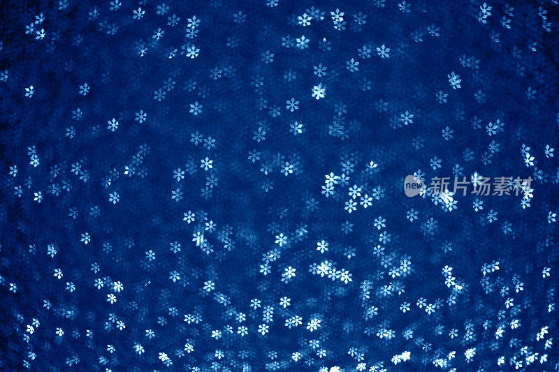 圣诞背景-雪花形状的散景(蓝色)