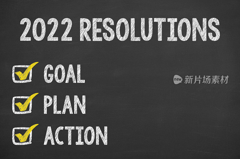 在黑板背景上写下2022年新年决心