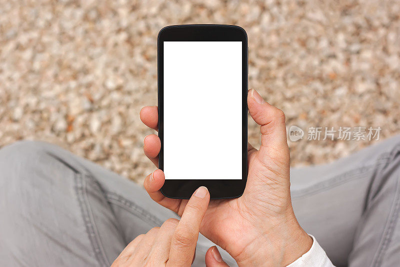 手握智能手机与白色空白空白屏幕