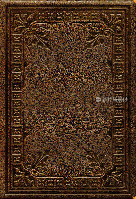一个棕色的古董皮革书封面的特写