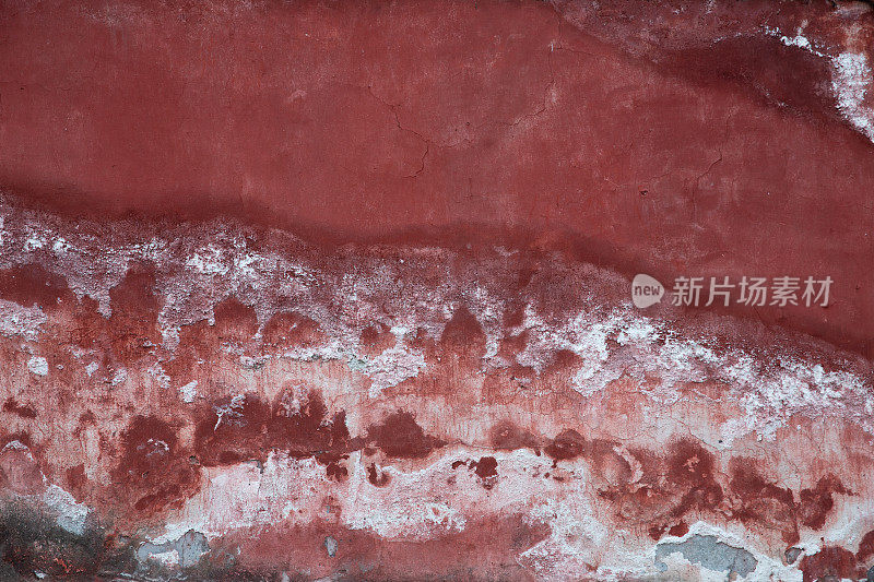 深红的颜色和酒红色的背景红色斑驳的墙壁