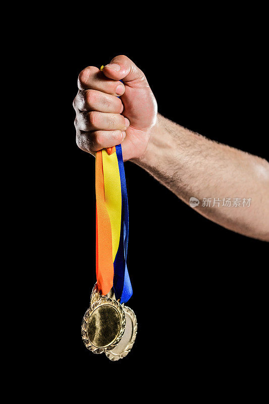 手握两枚奥运金牌