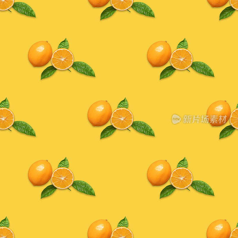 无缝模式与梅耶柠檬和绿叶在黄色的背景。水果的模式。热带抽象背景。最小的水果的概念