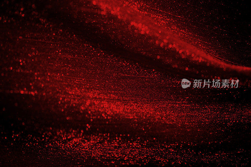 红色黑色闪光背景雪纺圣诞情人节中国新年抽象霓虹灯暗红红宝石图案薄纱网散景五彩纸花褐红色纹理全帧微距摄影
