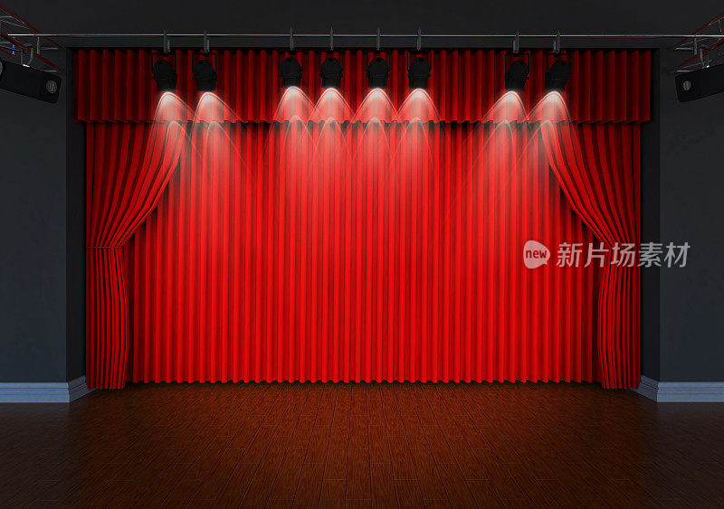 有红色窗帘和聚光灯的剧场舞台