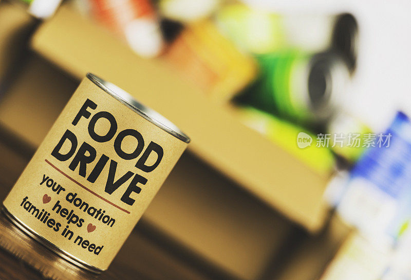 请支持我们的食物募捐活动。罐头食品开车