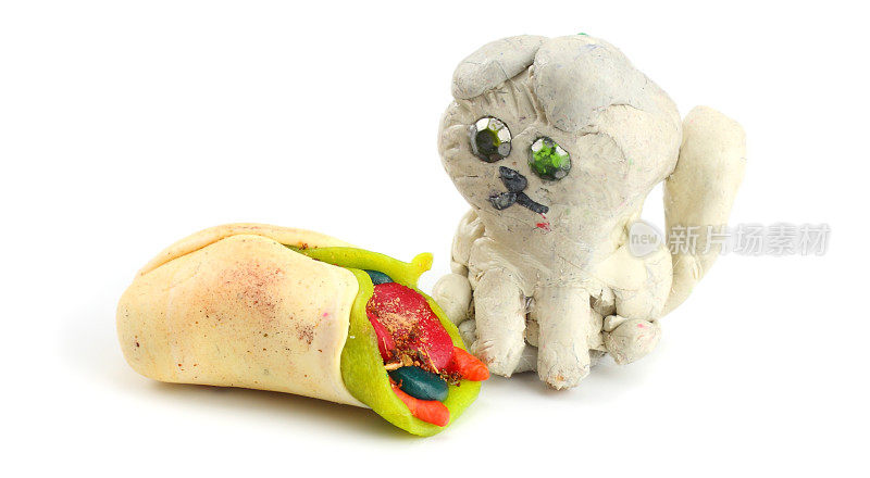 孩子的模型粘土猫孤立在白色的背景