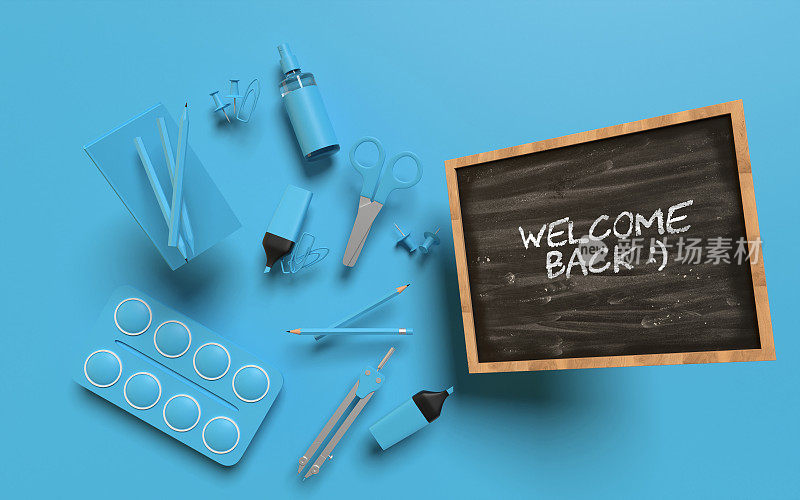 欢迎回到学校概念与蓝色的学校设备的一面黑板在蓝色的背景