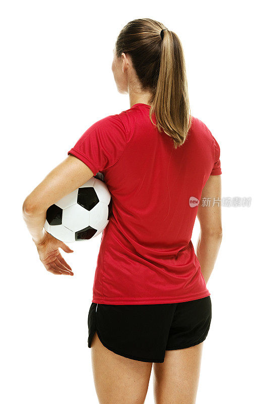 女足球运动员站立的后视图