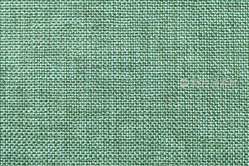 浅绿色纺织品背景特写。织物宏的结构