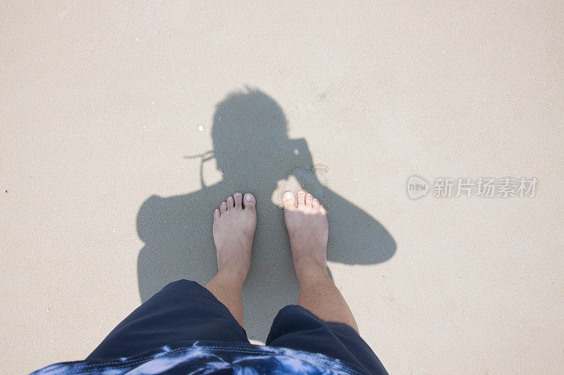 男人的腿照片拍摄自己的影子海滩