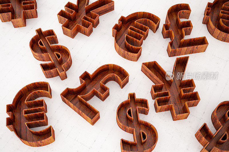 木制的货币符号。美元欧元英镑日元