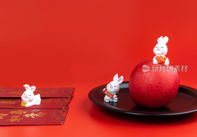 2023年。兔子装饰与汉语句子分别表示吉祥如意，心想事成，吉祥如意，万事如意，放在红包上意味着万事重要。