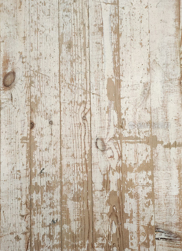 背景图像。涂成白色的木板磨损严重，划伤严重。