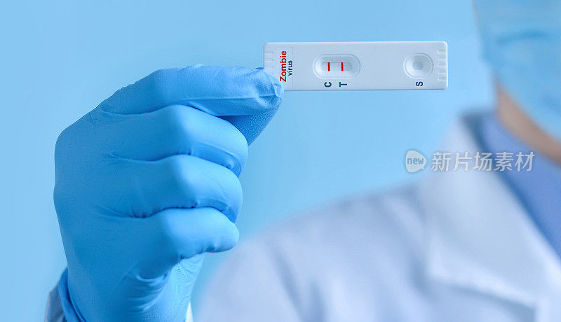 一位戴着防护口罩和手套的医生正在展示僵尸病毒的快速实验室检测。测试结果呈阳性。病毒诊断，抑制疾病爆发。