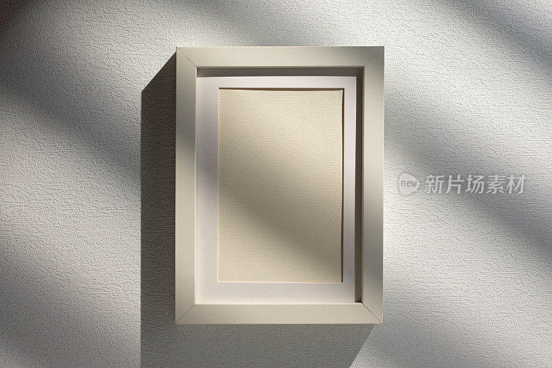 空白模型相框与阳光窗口在白色工作室