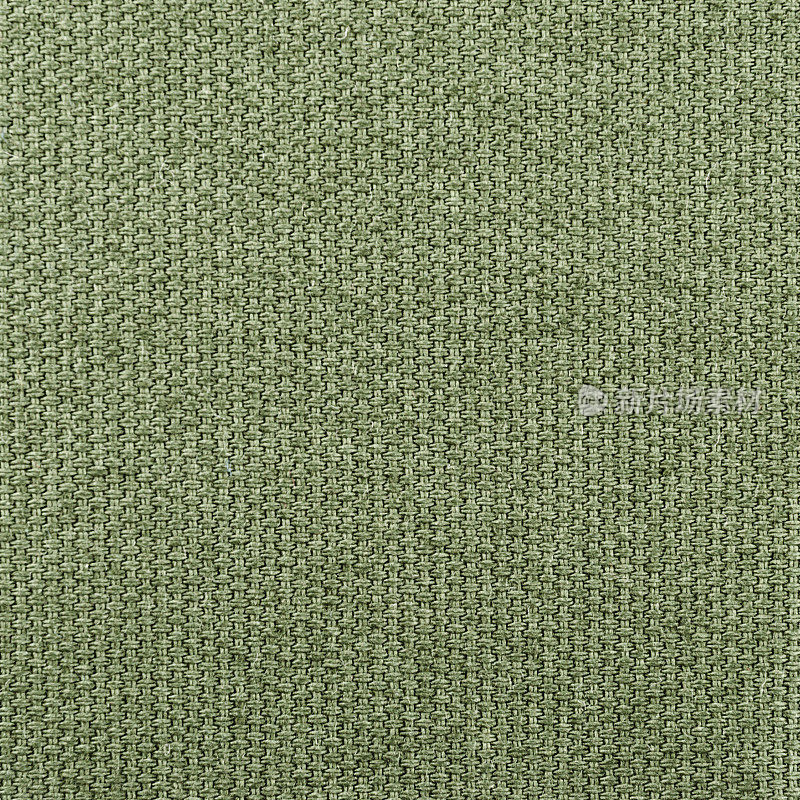 粗糙的粉彩绿色织物纹理背景