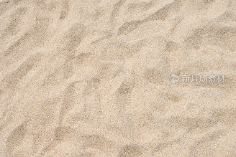在夏天沙滩的沙粒图案的特写