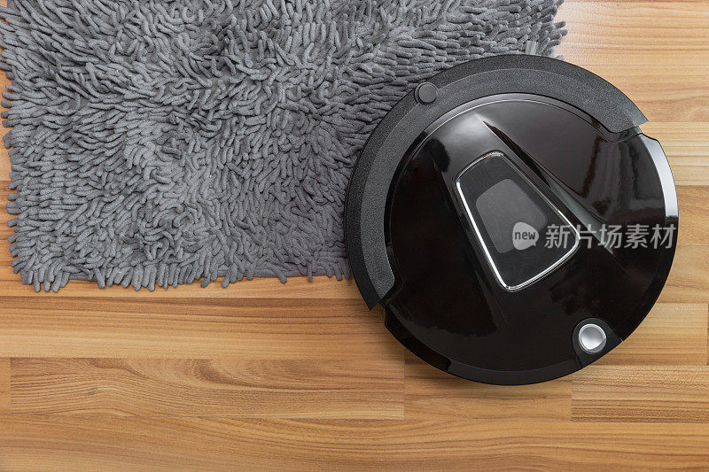 机器人真空吸尘器在强化木地板和地毯清洁