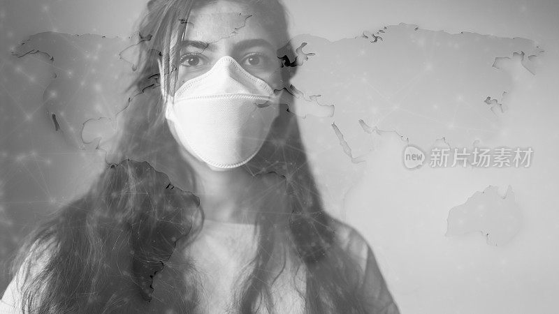 冠状病毒2019-nCov背景概念耐心地戴上带有世界地图覆盖的防护面具。