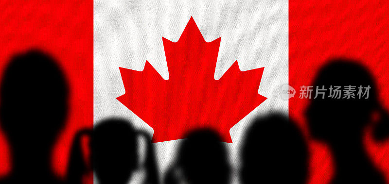 剪影的人与加拿大国旗