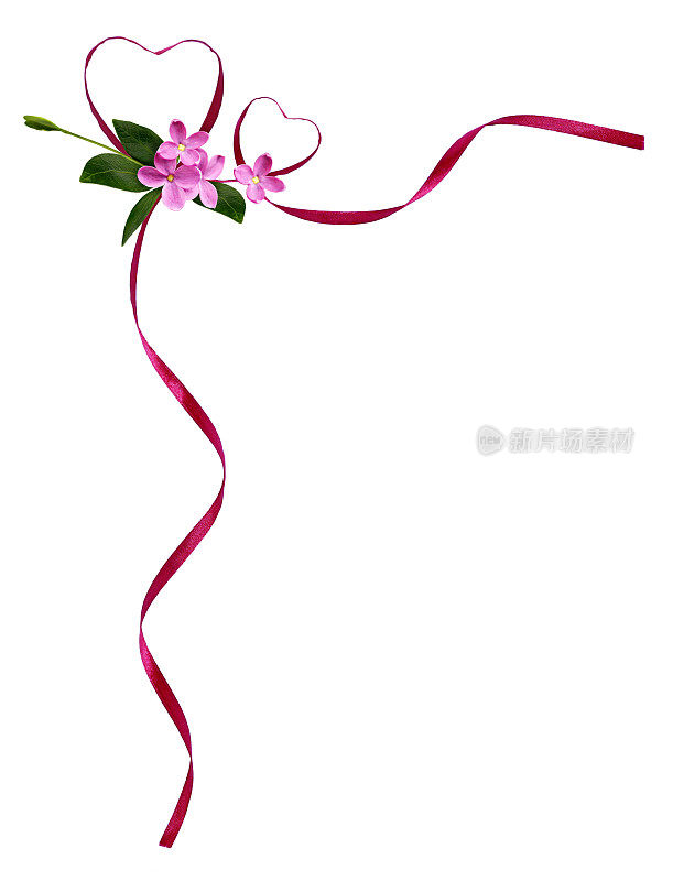 粉红色的丝带心形和小花在角落里布置，以迎接情人节的到来
