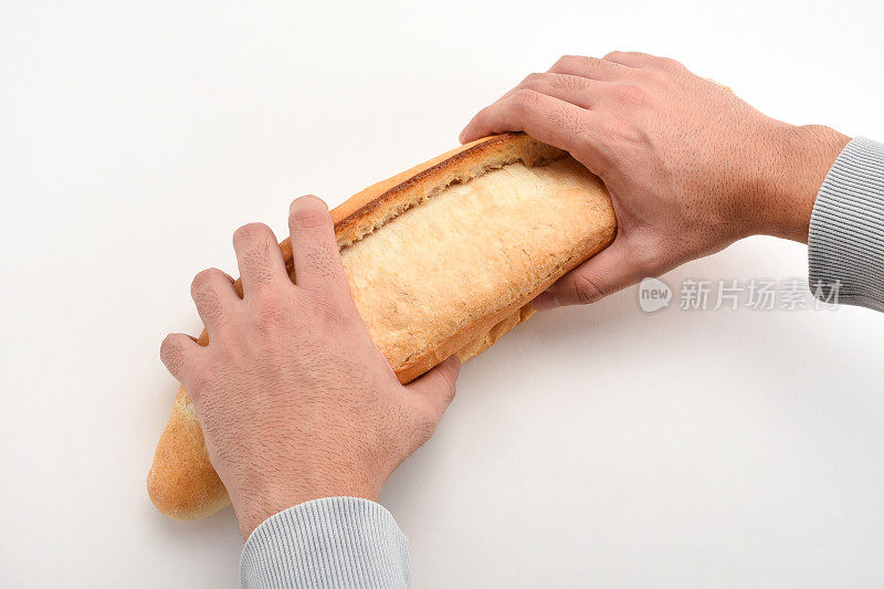 掰面包，手拿面包，掰面包