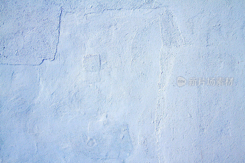 旧西西里墙壁背景:粗糙的浅蓝色石膏纹理