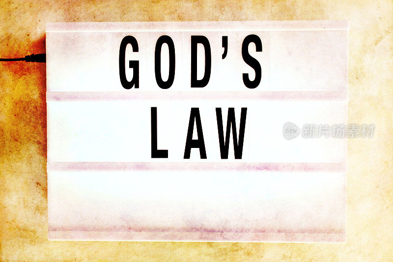 “上帝的法则”在一个古老的灯箱主题
