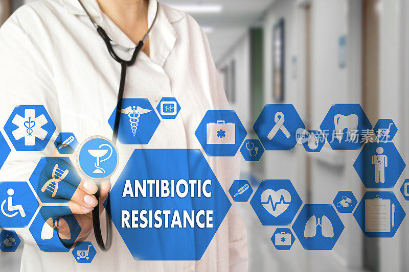医生和抗生素耐药词在医疗网络上连接在医院的虚拟屏幕背景上。技术和医学概念。