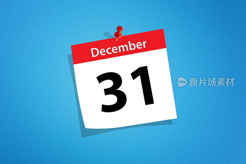日历用红色图钉钉着12月31日除夕的概念