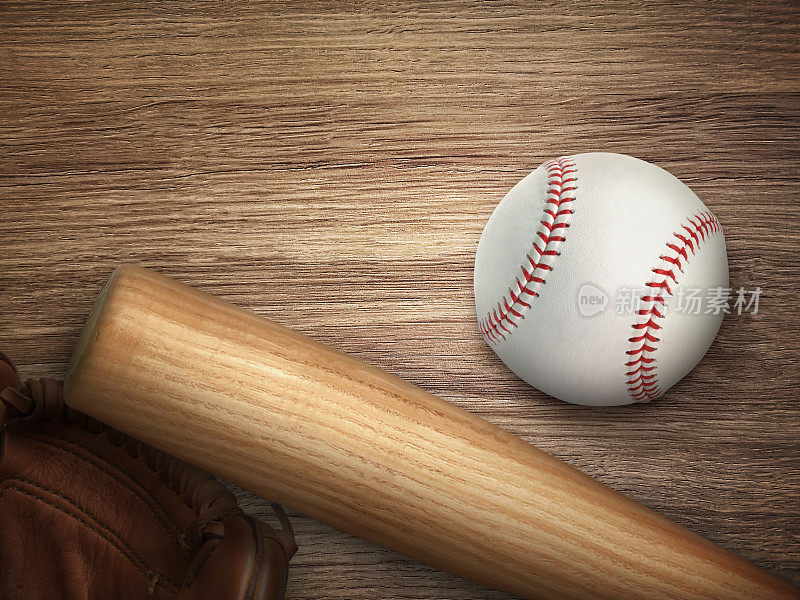棒球棒，手套和球放在木地板上。体育主题背景与文字和广告的拷贝空间