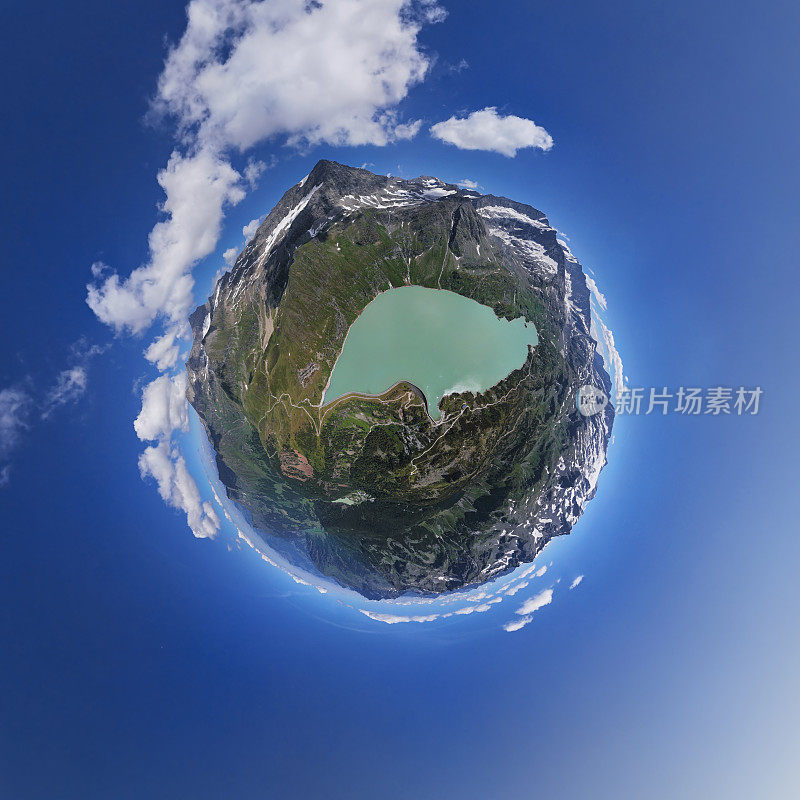 小行星航空全景图的陶恩穆西高山湖和弯曲大坝，在霍赫陶恩国家公园，萨尔茨堡土地，奥地利。