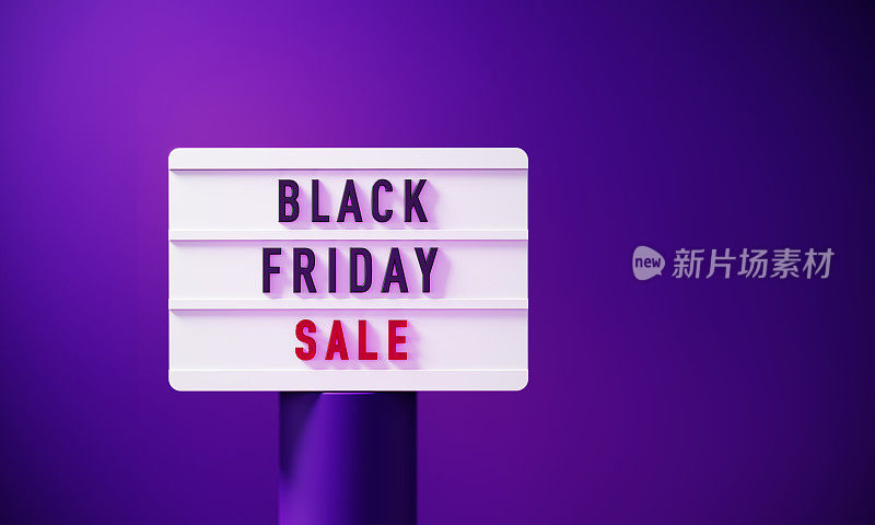 黑色星期五销售写白色灯箱坐在紫色讲台前紫色背景