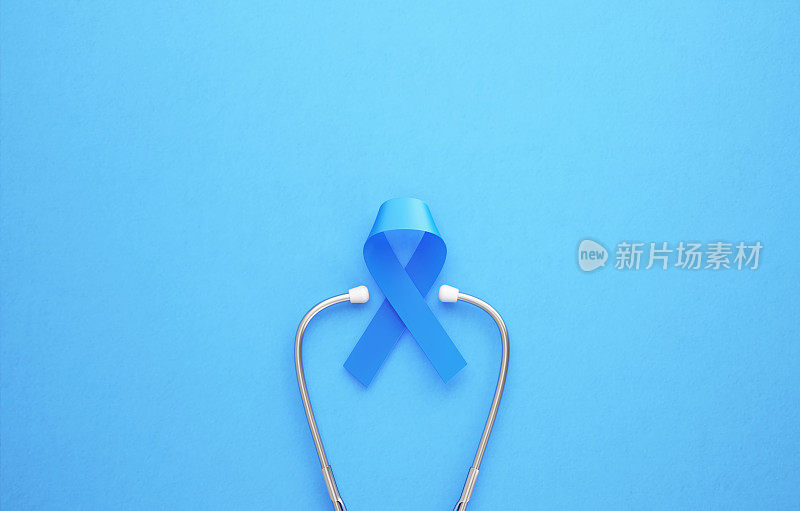 蓝色背景的前列腺癌意识带和听诊器