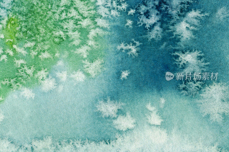 雪花纹理与水彩颜料在纸上