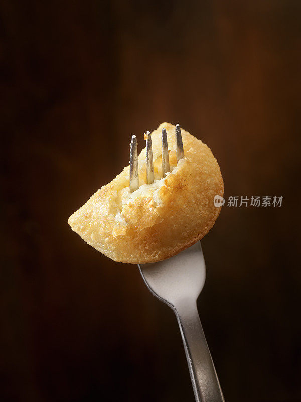 叉子上的Pierogi