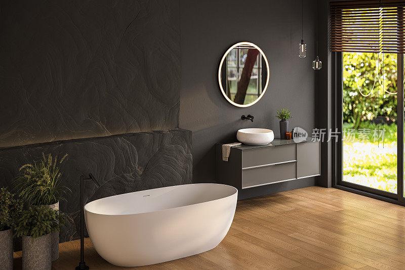 现代浴室内饰，白色浴缸和别致的梳妆台，黑色墙壁，拼花地板。