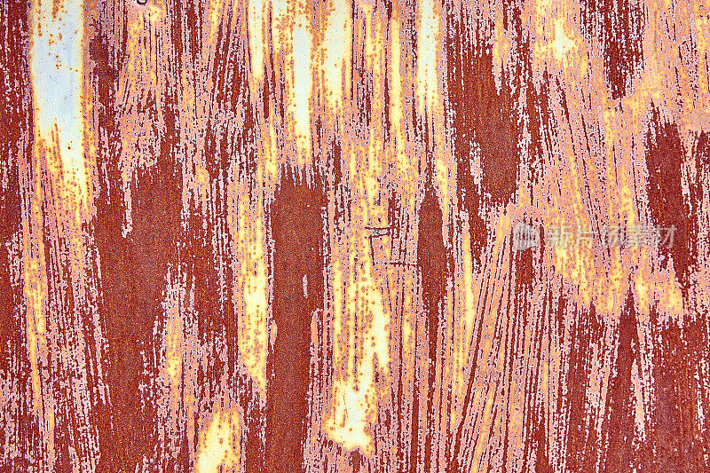 破旧的棕色赤陶土铜锈背景与粗糙的纹理多种颜色的内含物。染色梯度粗糙颗粒表面。壁纸
