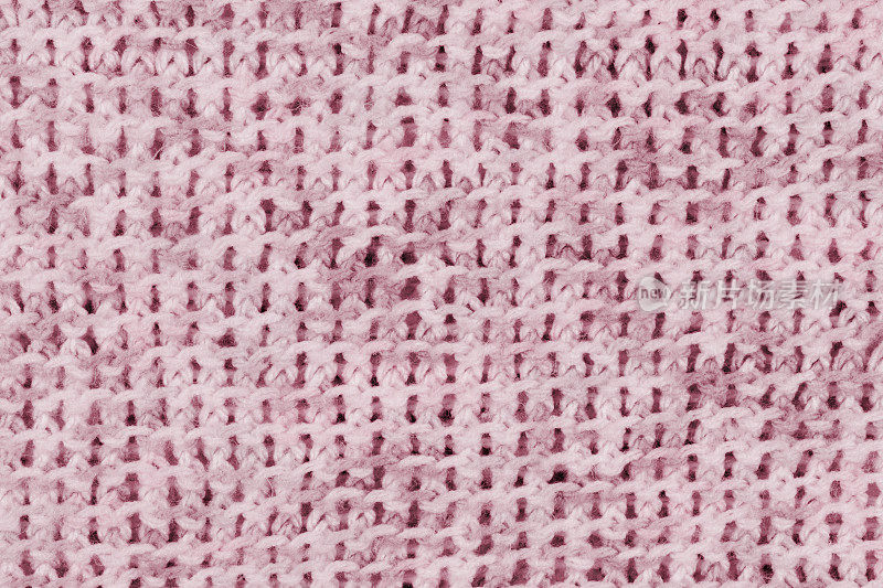 粉红色针织针法图案背景